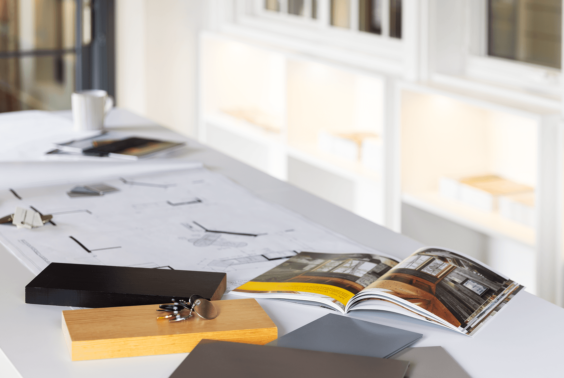 Samples and books on a table at 7 Tide.